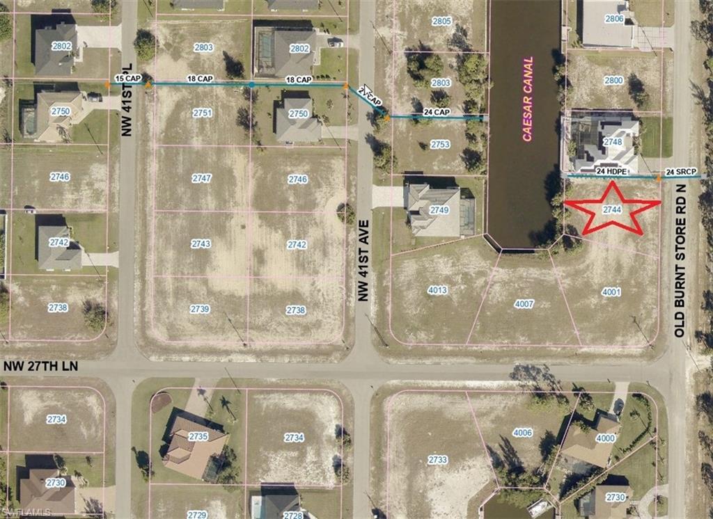 Image 1: Aerial view of property's location with property parcel outlined