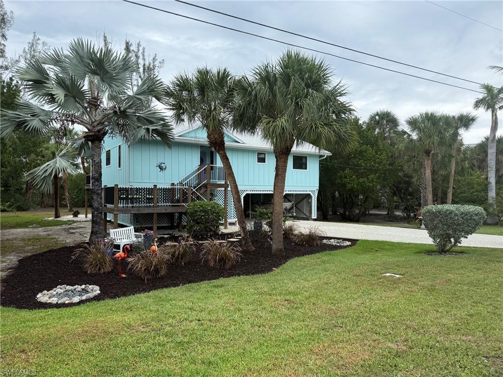 Image 3: Front Yard and Plantings