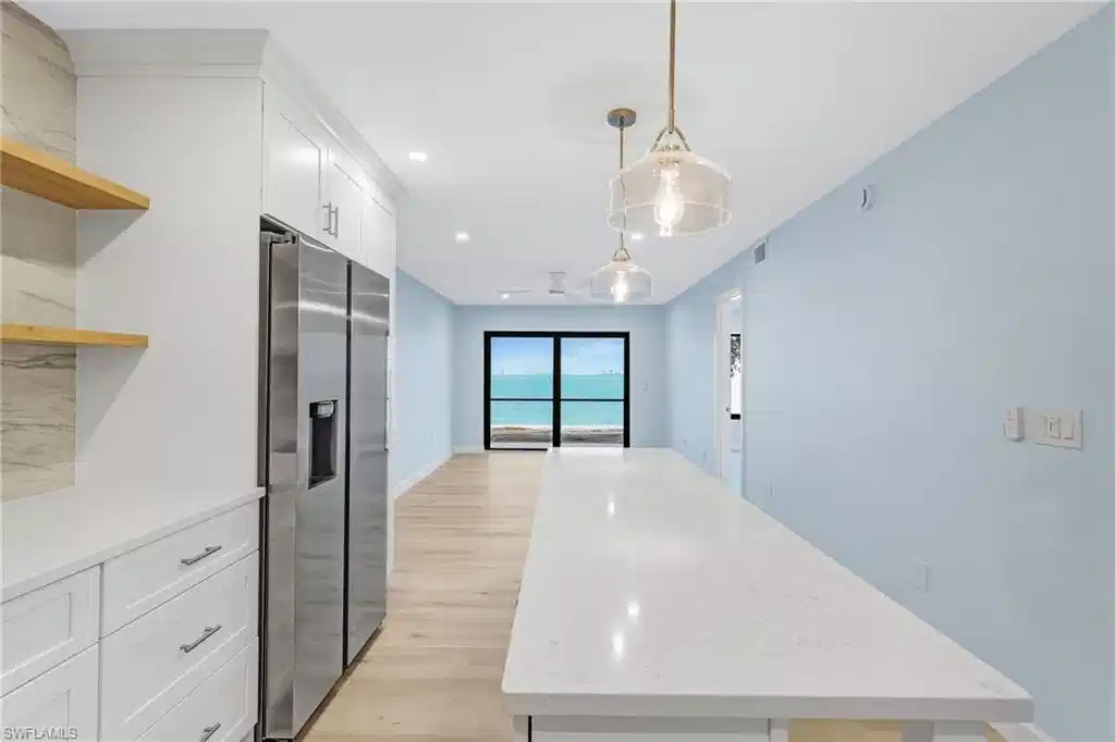 Image 1: Welcome to easy island living from this beautifully remodeled first-floor bayfront condo.