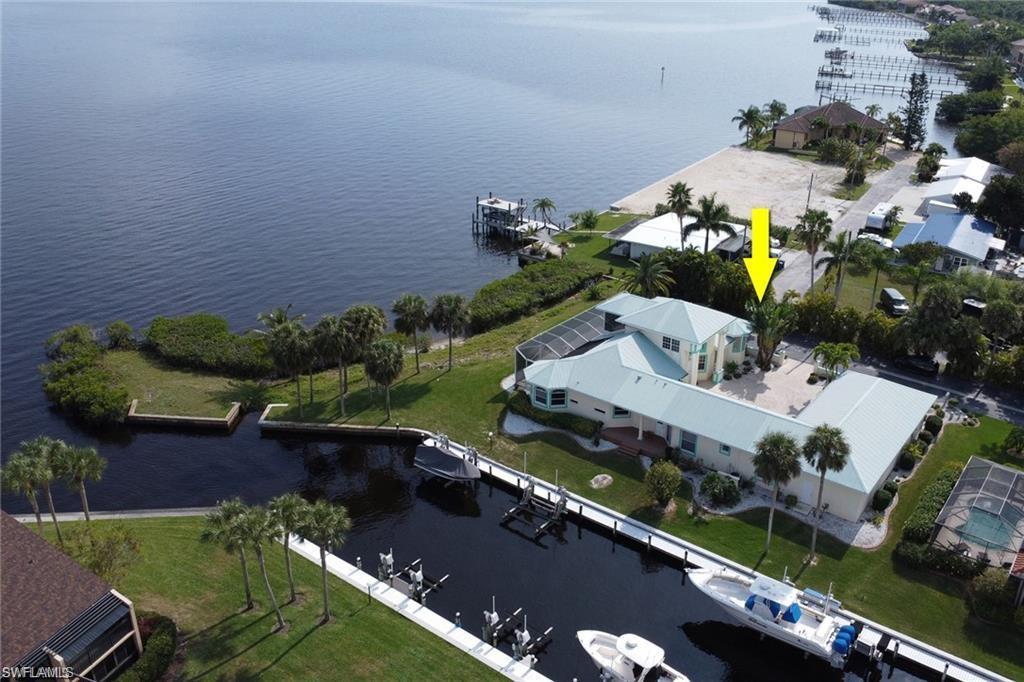 Image 3: Aerial view featuring a water view