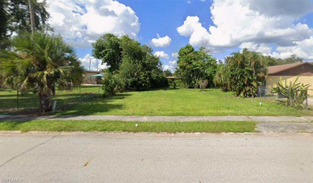 Image 1: View of grassy yard