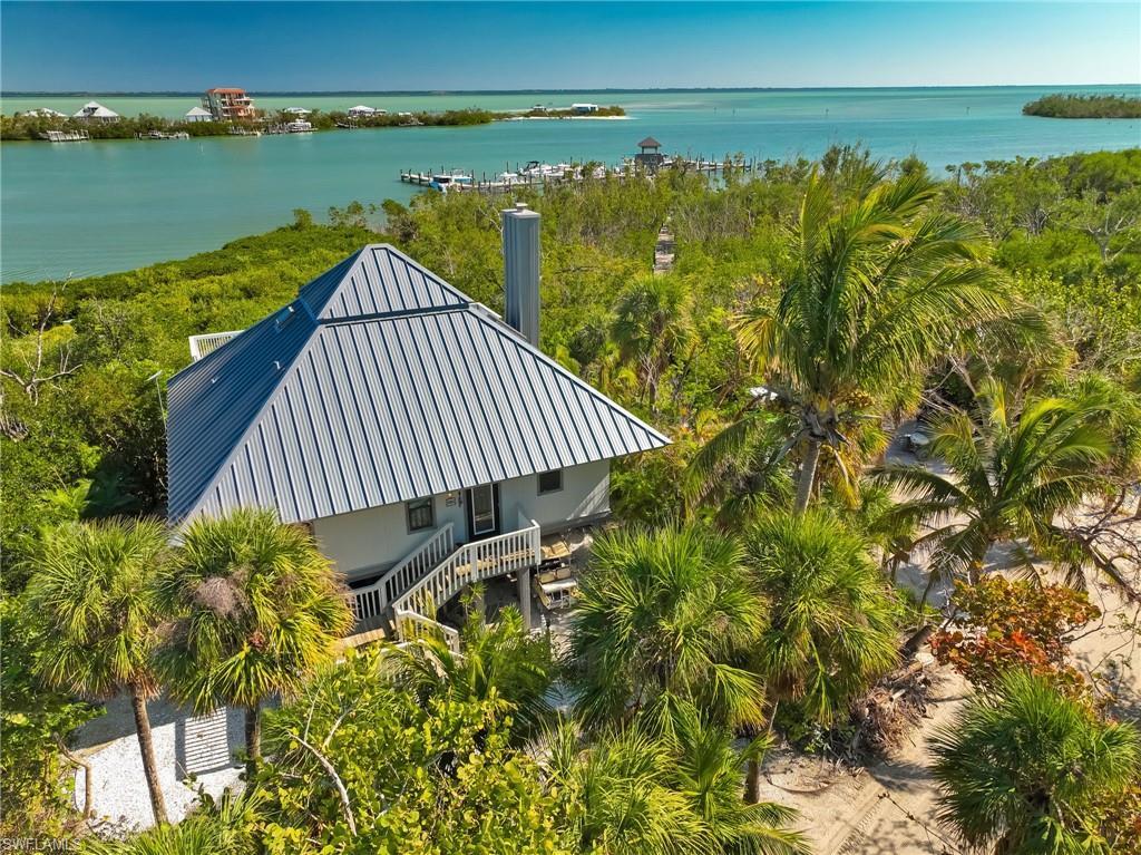 Image 1: Drone / aerial view featuring a water view