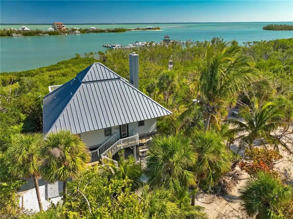 Image 1: Drone / aerial view featuring a water view