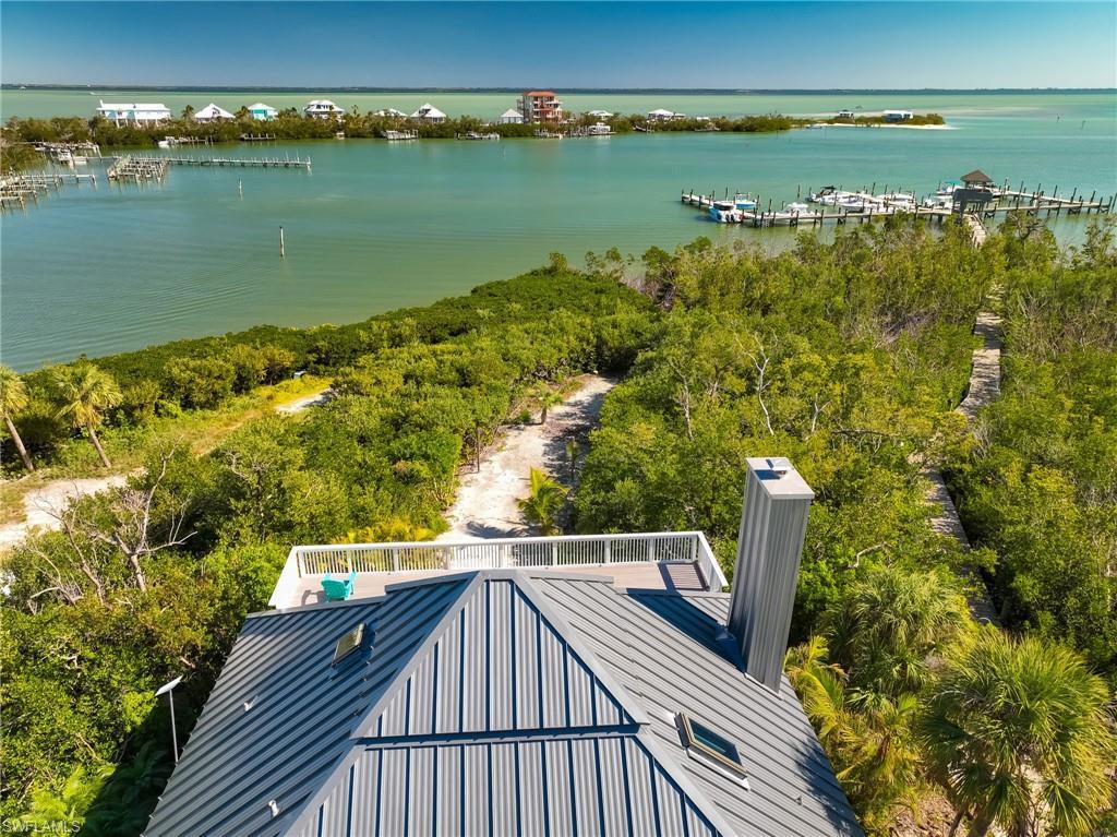 Image 3: Drone / aerial view featuring a water view