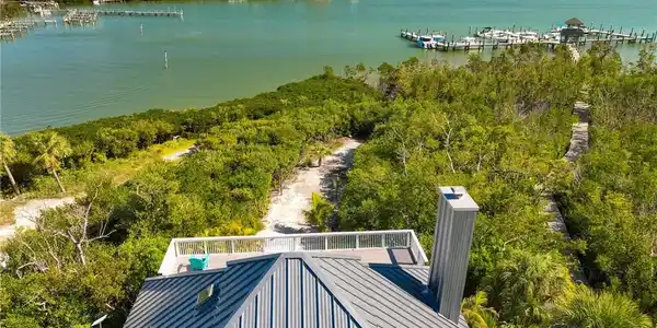 Image 3: Drone / aerial view featuring a water view