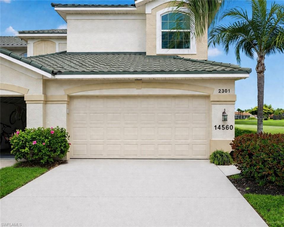 Image 3: Two car garage and parking for two cars in driveway