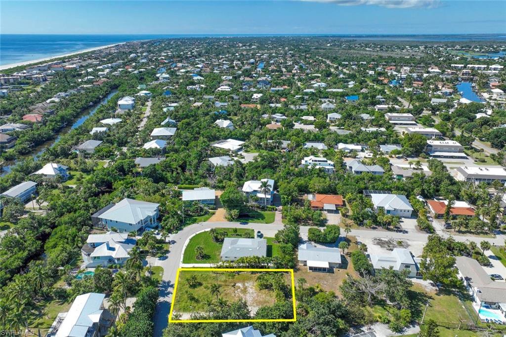 Image 3: View of property location featuring a large body of water and property boundaries highlighted