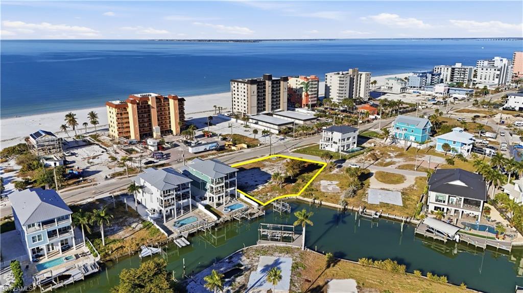 Image 3: Aerial view of a large body of water and apartment complex - Virtually Edited Image