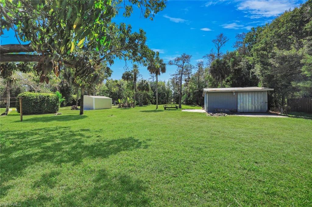 Image 3: One-acre parcel with southern exposure includes a detached workshop