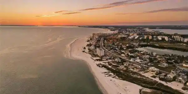 Image 2: Aerial view of expansive coastline