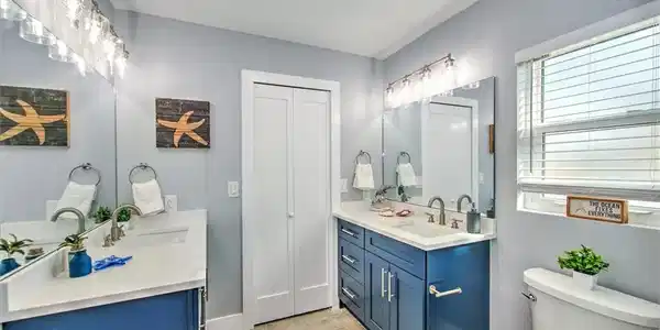 Image 4: Bathroom featuring toilet, vanity, and wood-type flooring