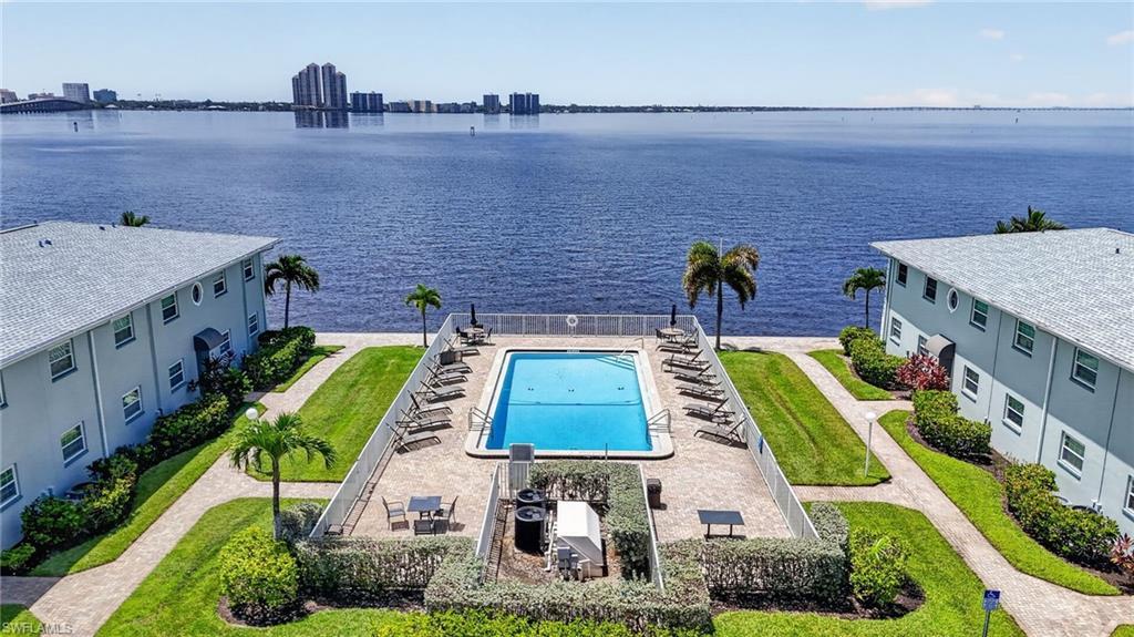 Image 1: Palms at Waters Edge pool overlooking the Caloosahatchee River