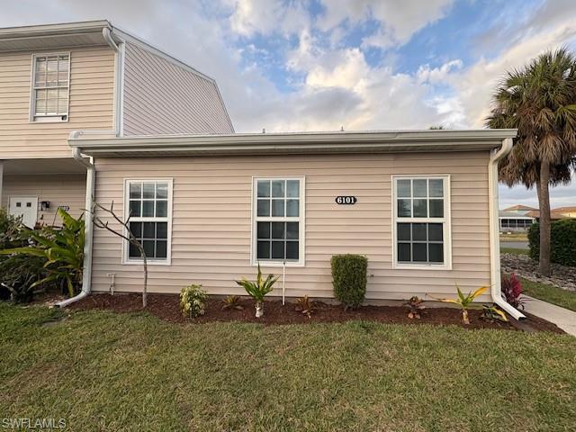 Image 4: View of front of house featuring a front lawn