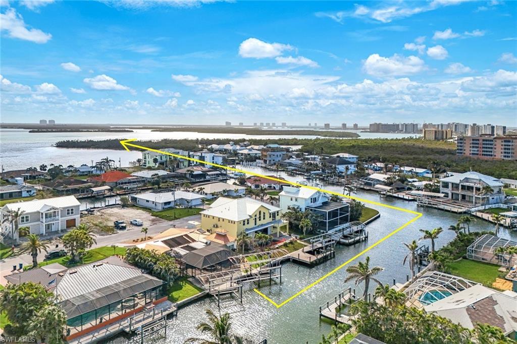 Image 2: Birds eye view of property with a water view and a city view