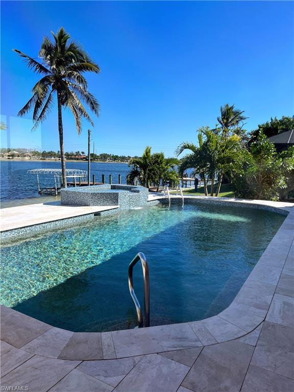 Image 2: Pool view from kitchen and family room