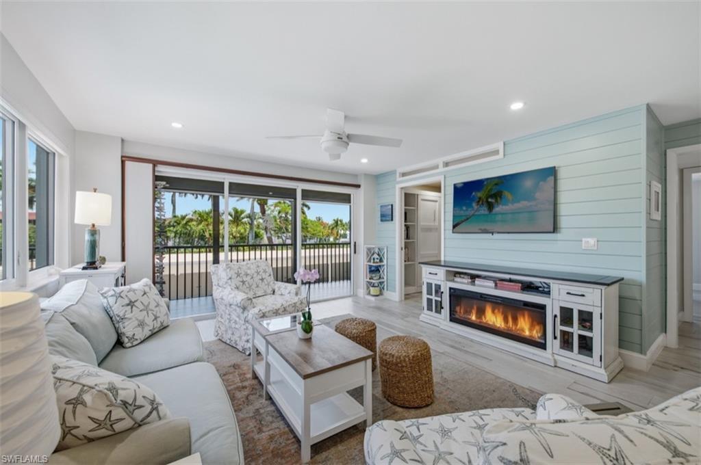 Image 3: Living room with electric fire place