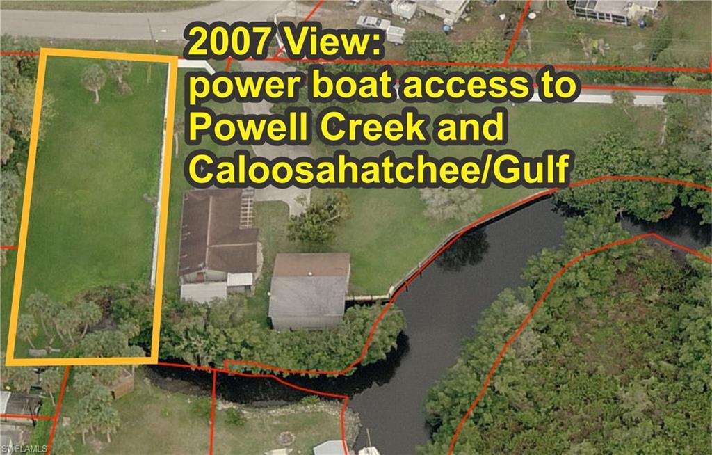 Image 3: This lot in 2007 showing cleared creek for power boat access.