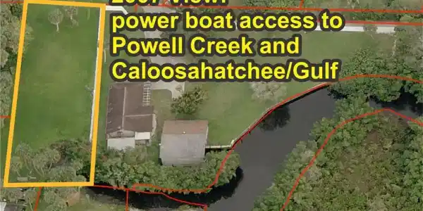 Image 3: This lot in 2007 showing cleared creek for power boat access.