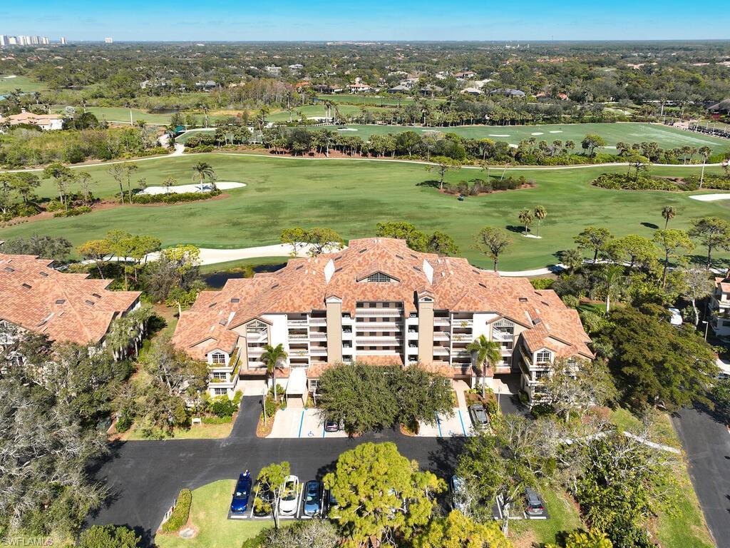 Image 4: Drone / aerial view.  This building is a great location with one of the best views of fairways