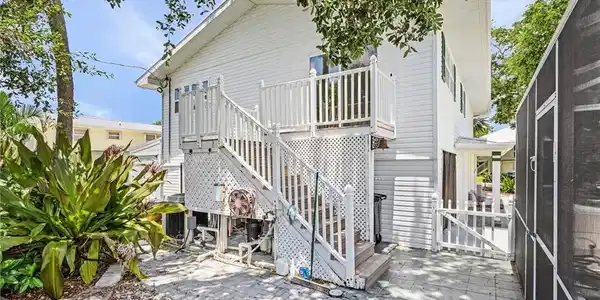 Image 3: Back of property featuring a patio area