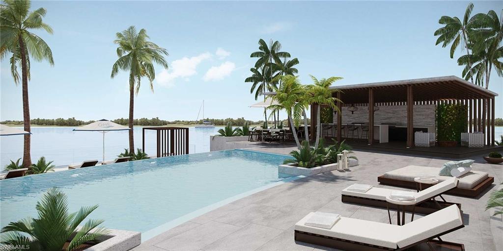 Image 3: View of swimming pool featuring a water view and a patio