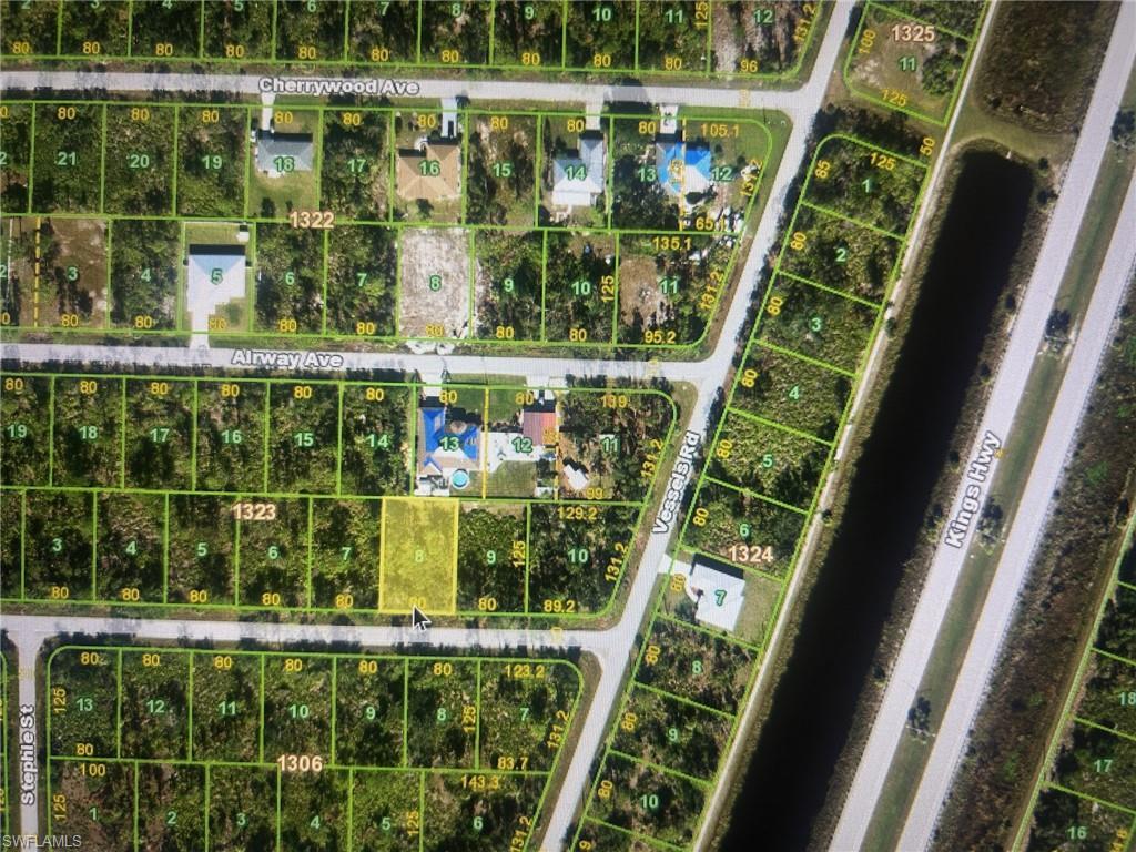 Image 2: Aerial overview of property's location featuring property boundaries highlighted