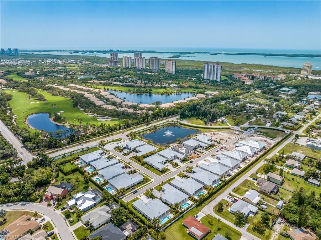 Image 1: Aerial view of Coconut Landing facing west. 4553 is Lot 25; the southwesternmost lot (currently empty)
