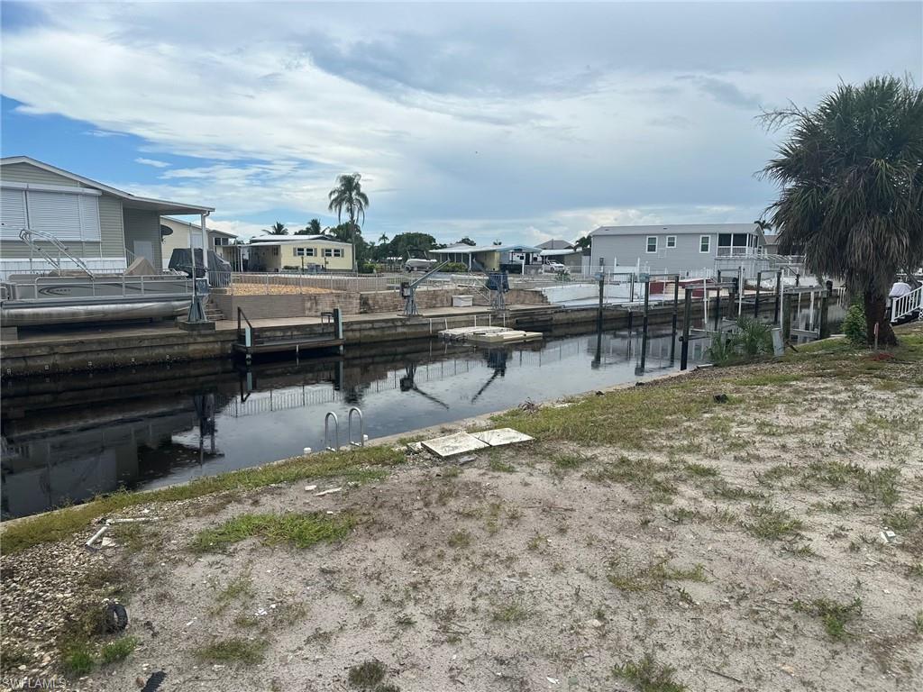Image 4: View of yard featuring a water view
