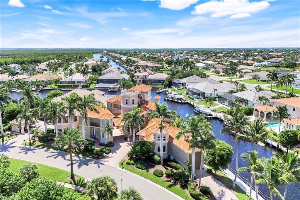 Image 4: Direct Gulf access with no restrictions, no fixed bridges, and no lock &mdash; just minutes to open water with a marina and fuel nearby. Enjoy a large turning basin for easy navigation and ample space for docking multiple vessels.