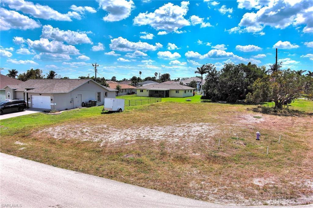 Image 4: View of yard featuring a residential view