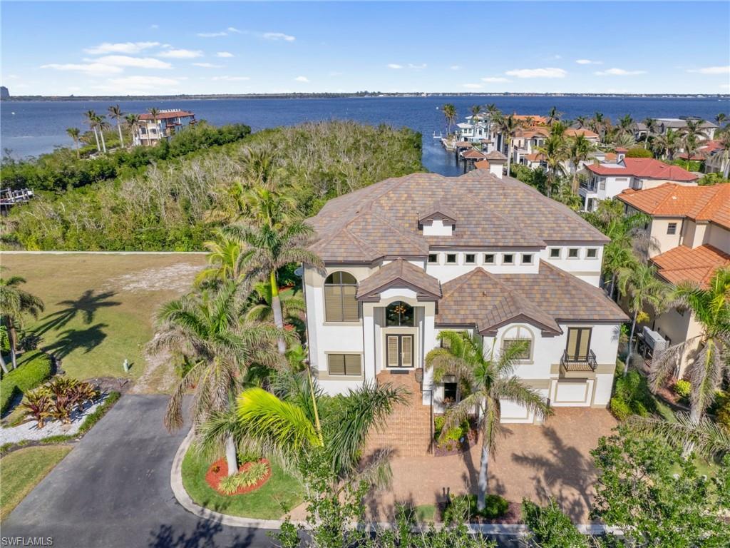 Image 2: Birds eye view of property with a water view