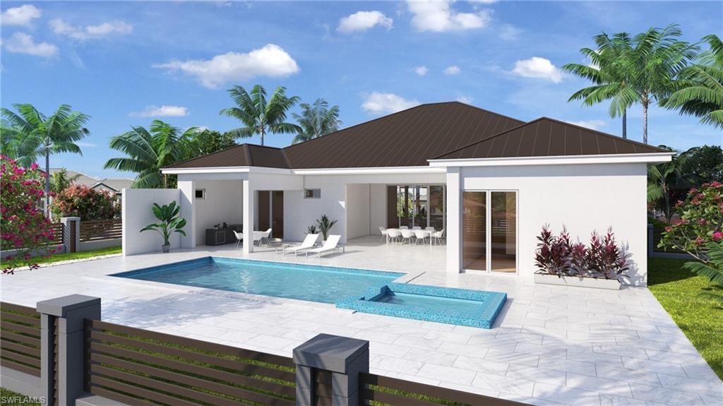 Image 2: Back of property with stucco siding, an outdoor pool, a patio, a metal roof, and a standing seam roof