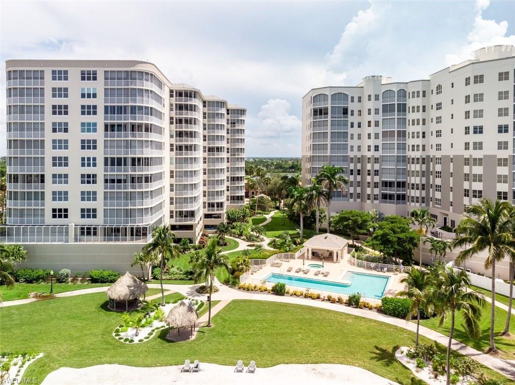 Image 1: View of apartment building / complex featuring a community pool