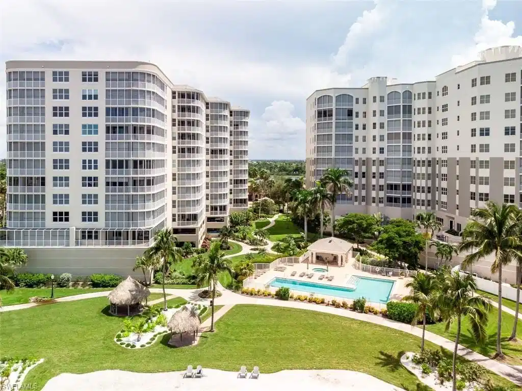 Image 1: View of apartment building / complex featuring a community pool