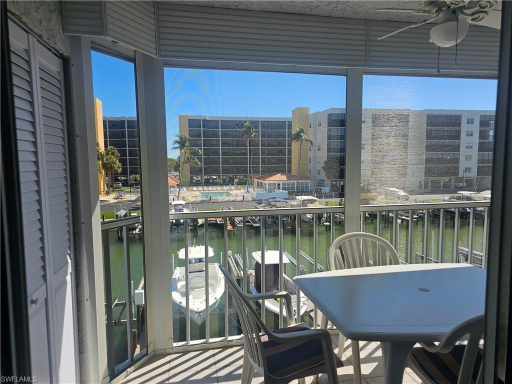 Image 3: Sunroom with a water view