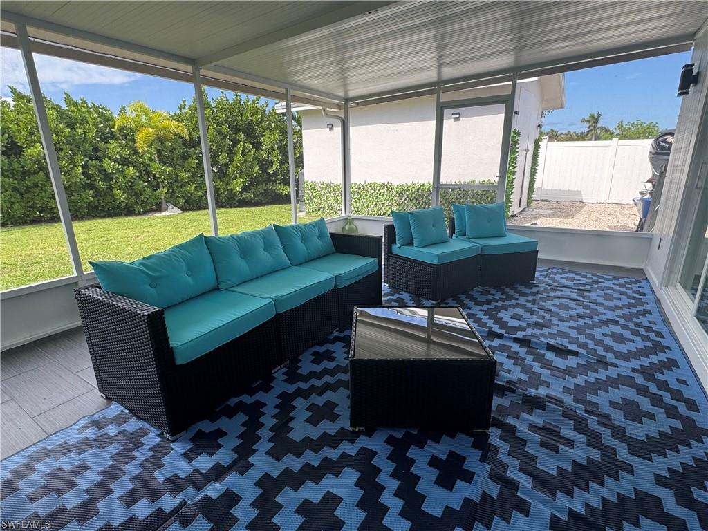 Image 3: Sunroom featuring wood style floor tile