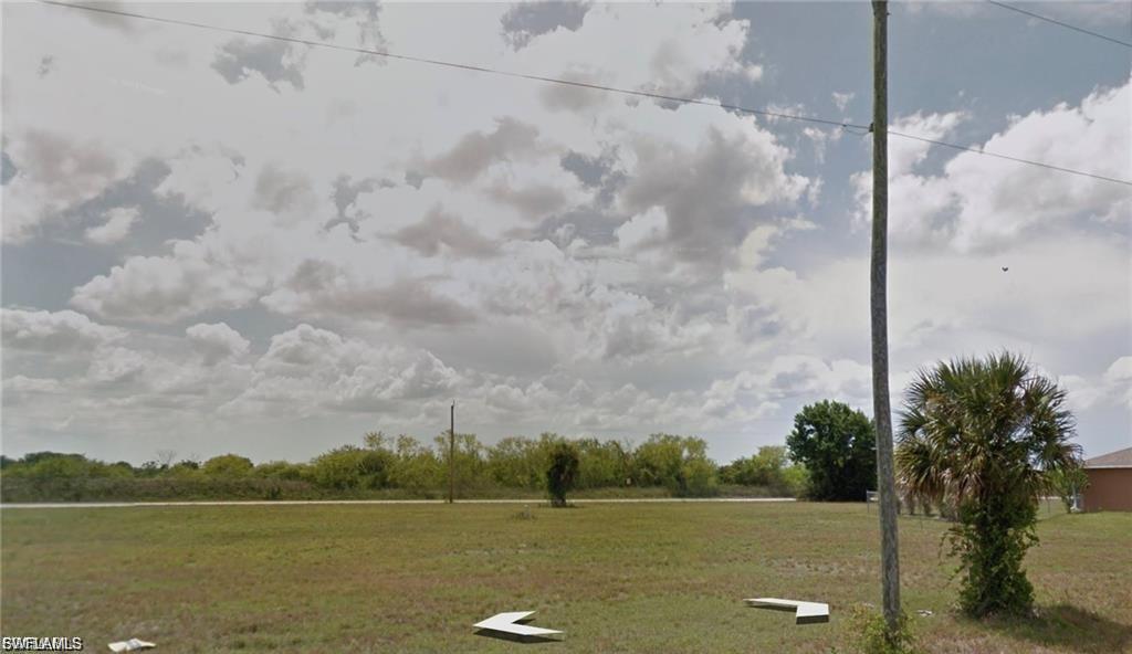 Image 4: View of community with a lawn