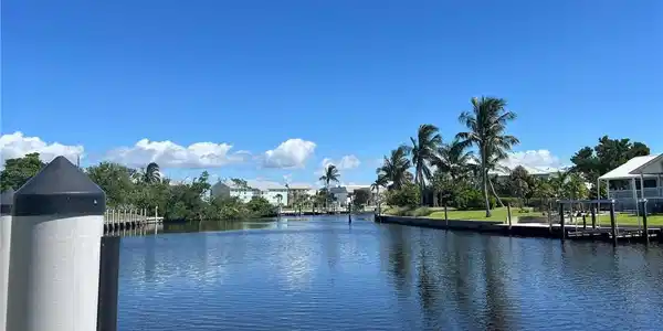 Image 2: Water view with a boat dock