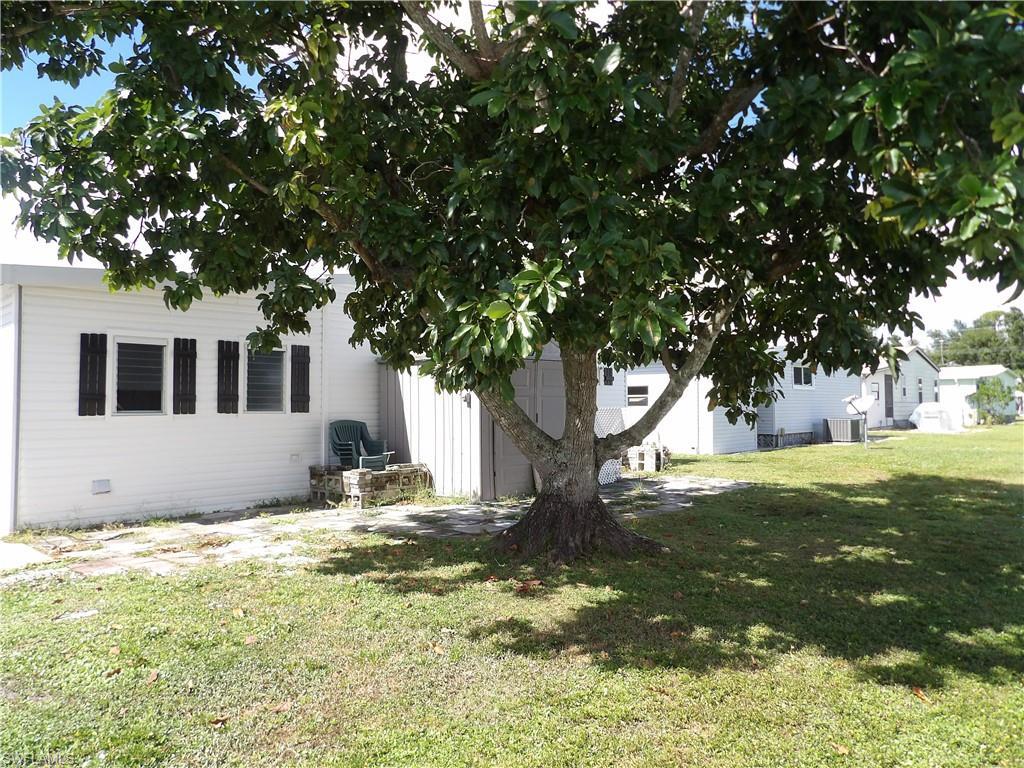 Image 2: Side view of the back of the home