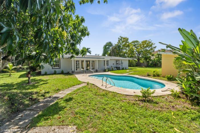 Image 4: Back yard/ Mango Tree/ Pool