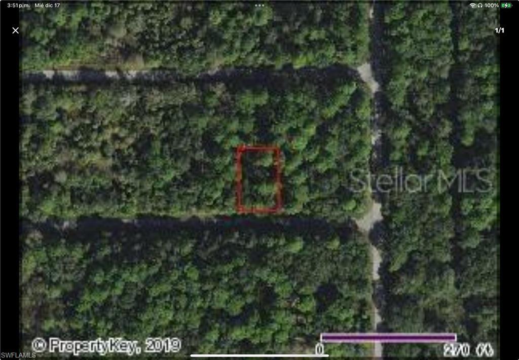 Image 1: Aerial map of property and surrounding area featuring property parcel outlined