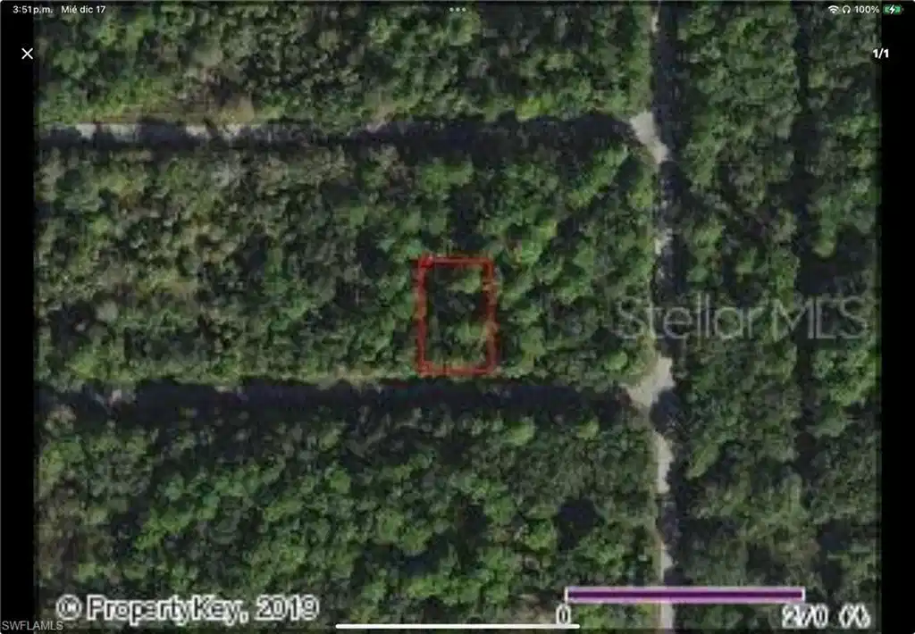 Image 1: Aerial map of property and surrounding area featuring property parcel outlined