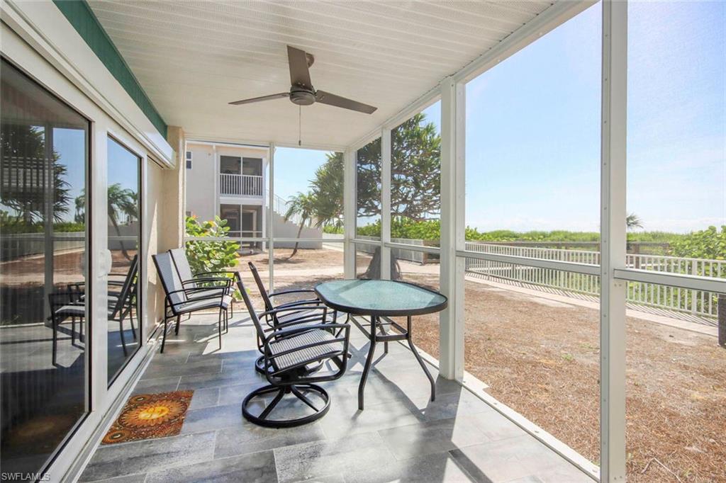 Image 3: Screened lanai with a ceiling fan and plenty of natural light