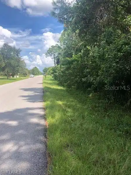 Image 1: View of asphalt street