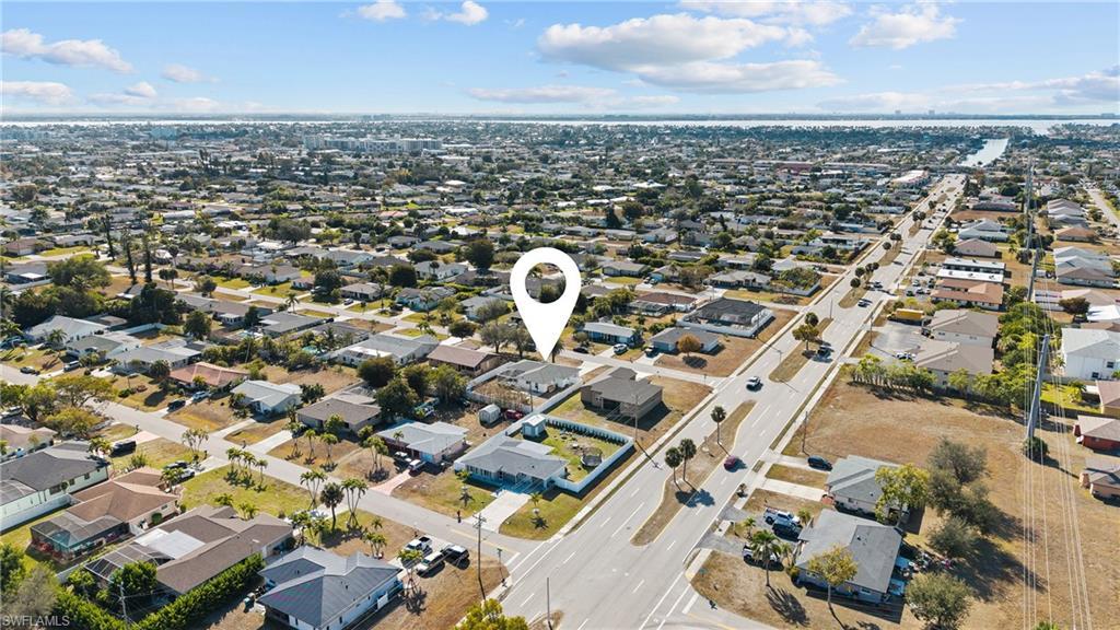 Image 2: View of property location with nearby suburban area