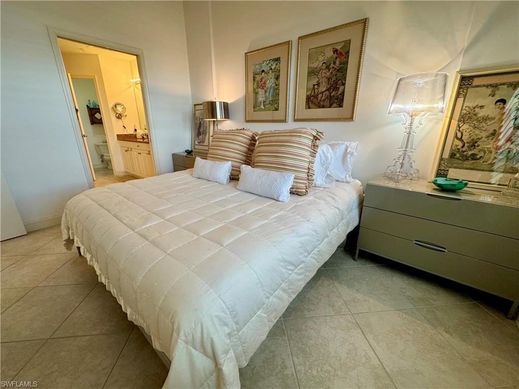 Image 3: Master bedroom with connected bathroom