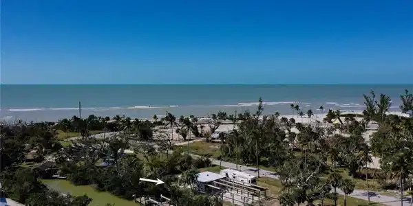 Image 3: Drone / aerial view with a water view