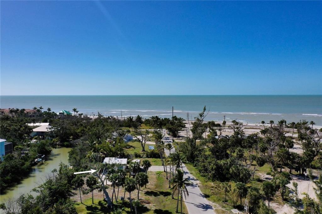 Image 4: Birds eye view of property featuring a water view