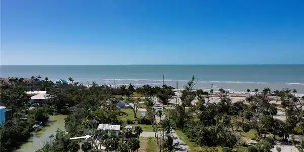 Image 4: Birds eye view of property featuring a water view