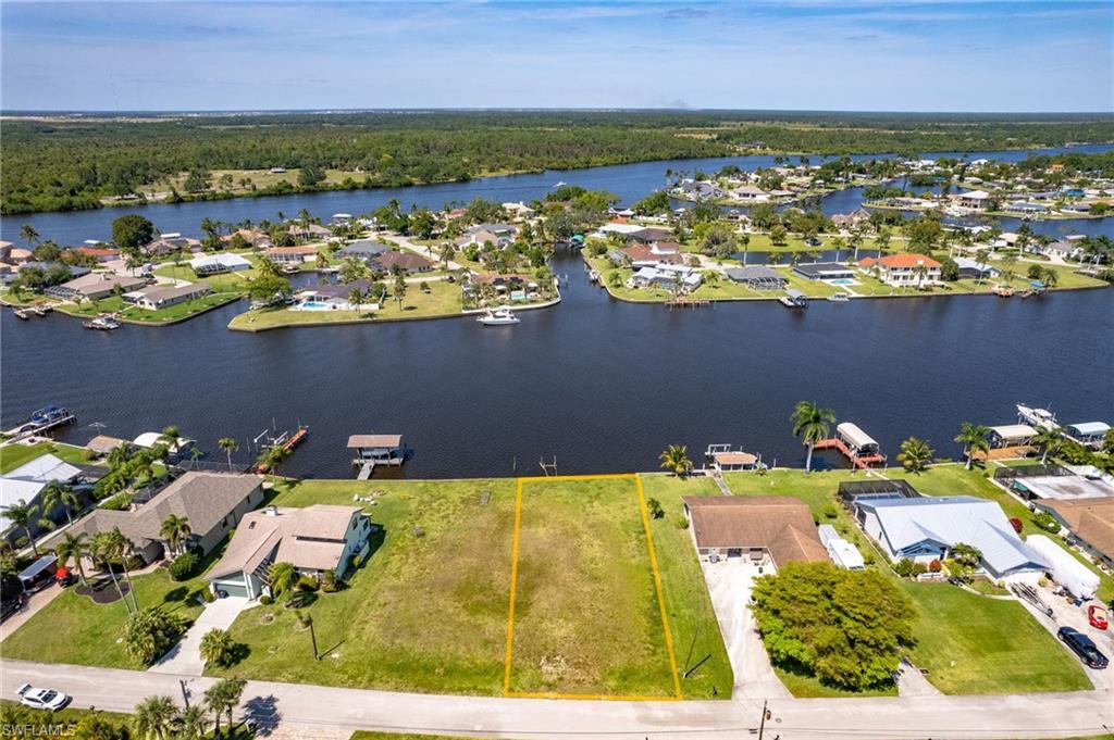 Image 4: Drone / aerial view with a water view